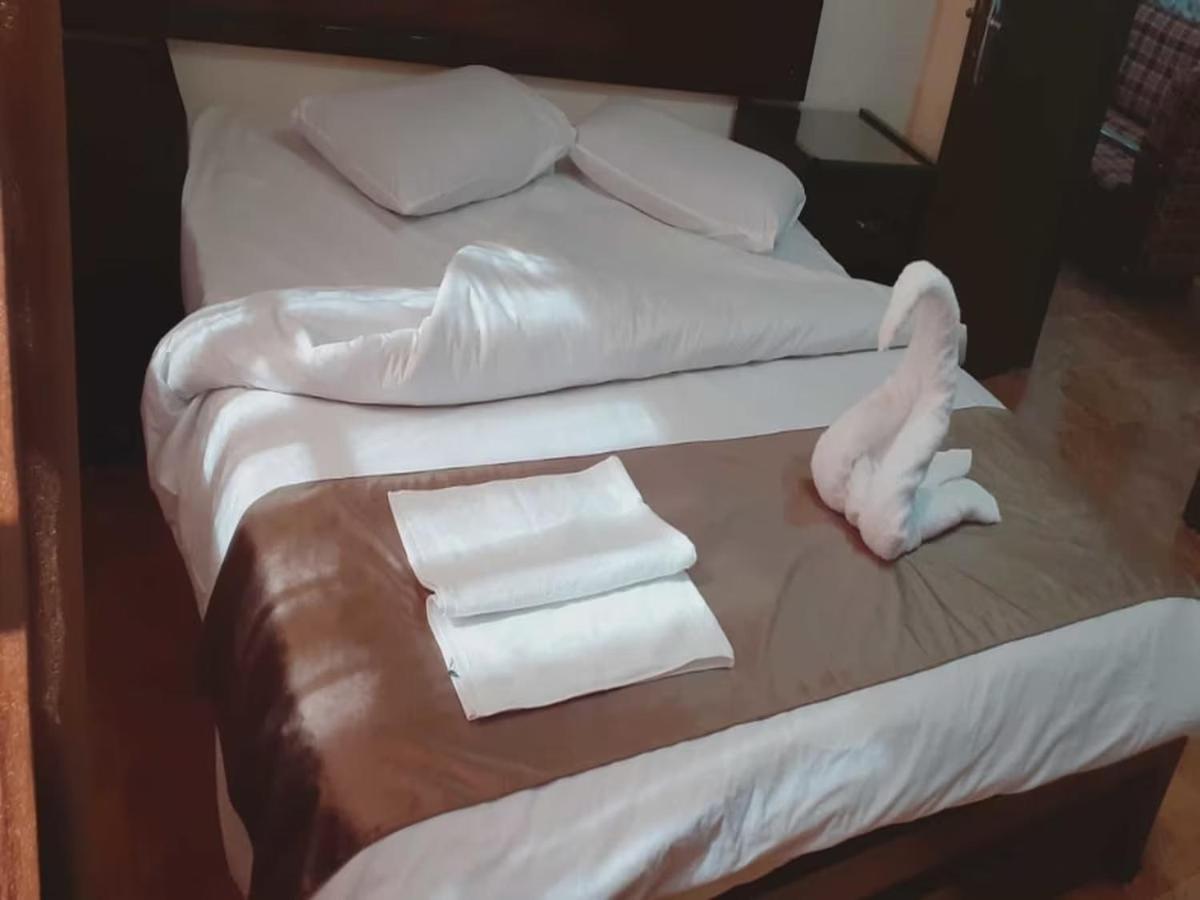 Al-Nujoom Hotel Suites Amman Buitenkant foto