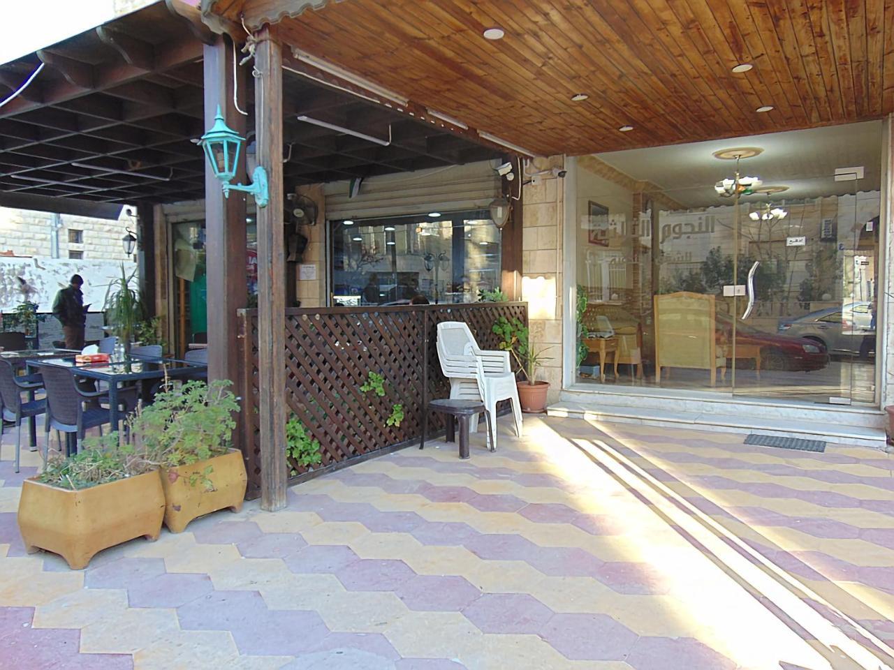 Al-Nujoom Hotel Suites Amman Buitenkant foto